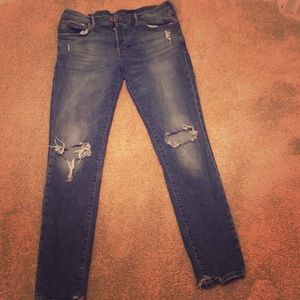 These H&M blue jeans with rips in the knees